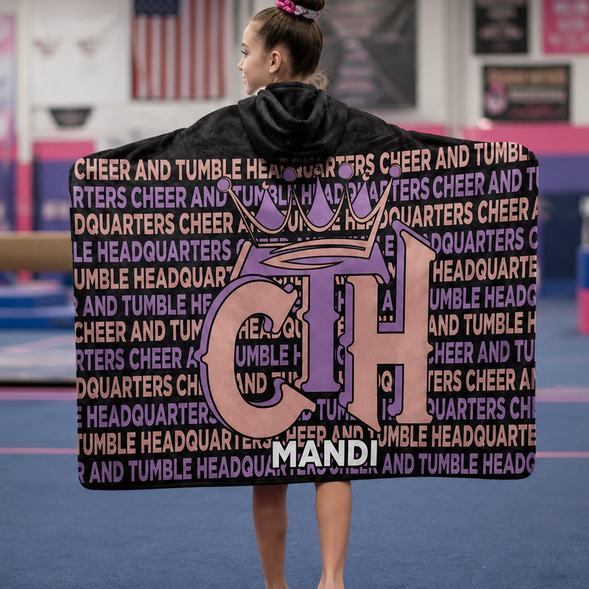 Close-up of custom name on cheer and tumble Minky fleece hooded wearable blanket
