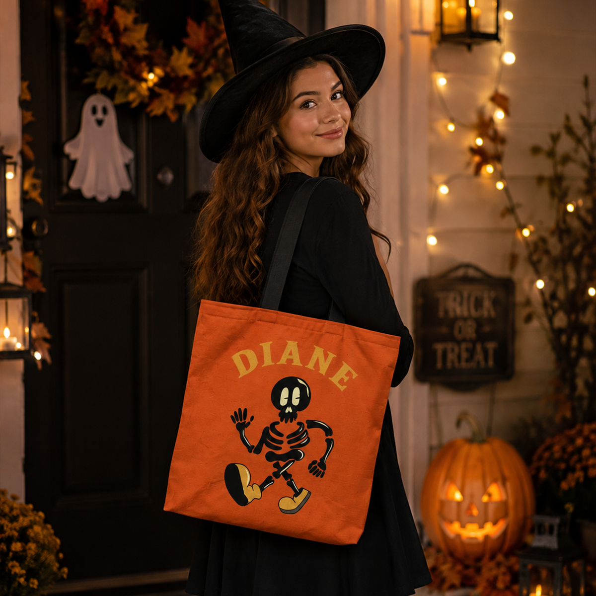 Child holding personalized Halloween skeleton tote bag as spooky trick or treat gift
