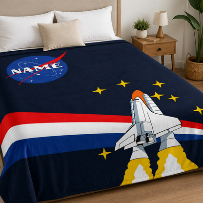Close-up of custom name on NASA launch polyester fleece throw blanket design
