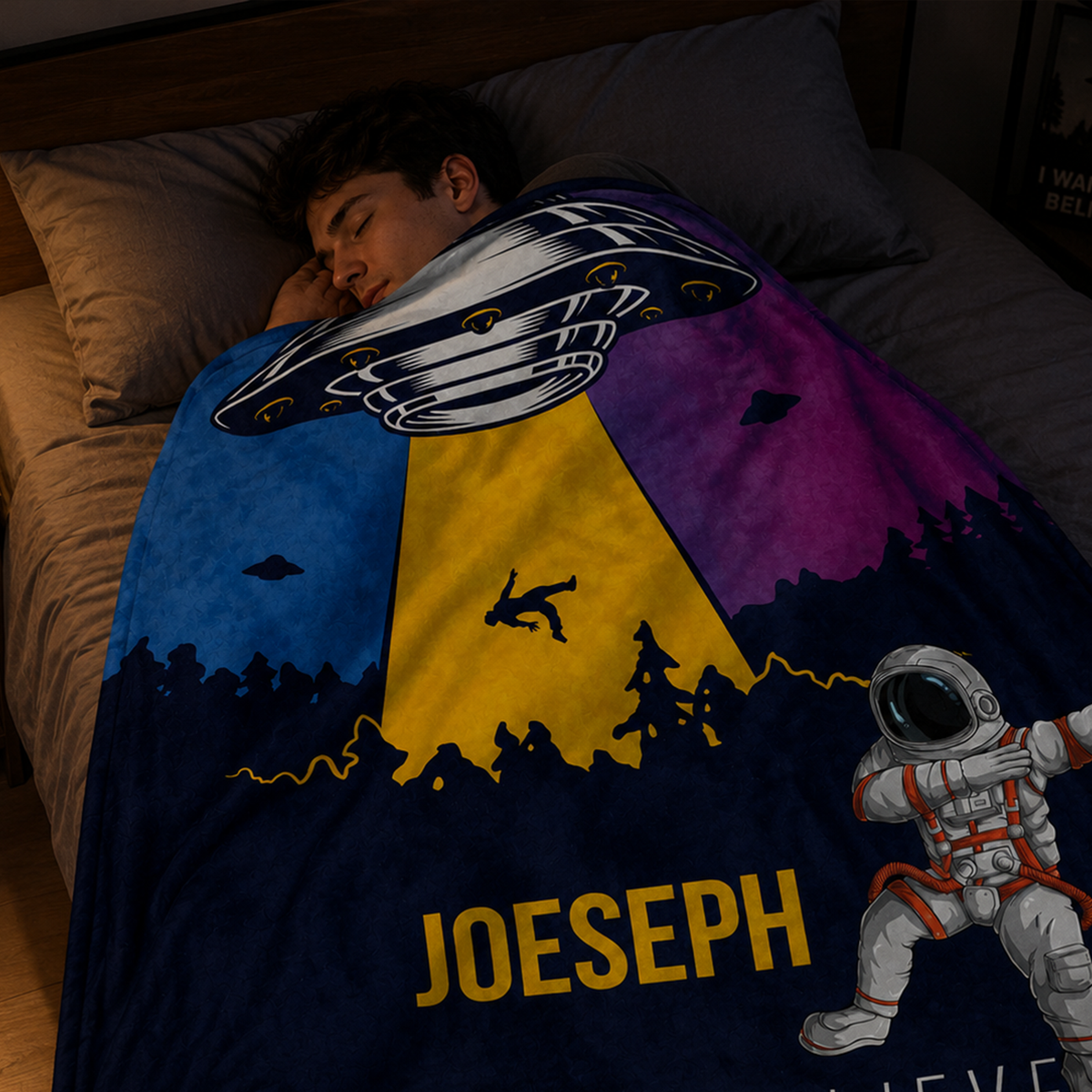 Close-up of custom name on alien invasion polyester fleece throw blanket design
