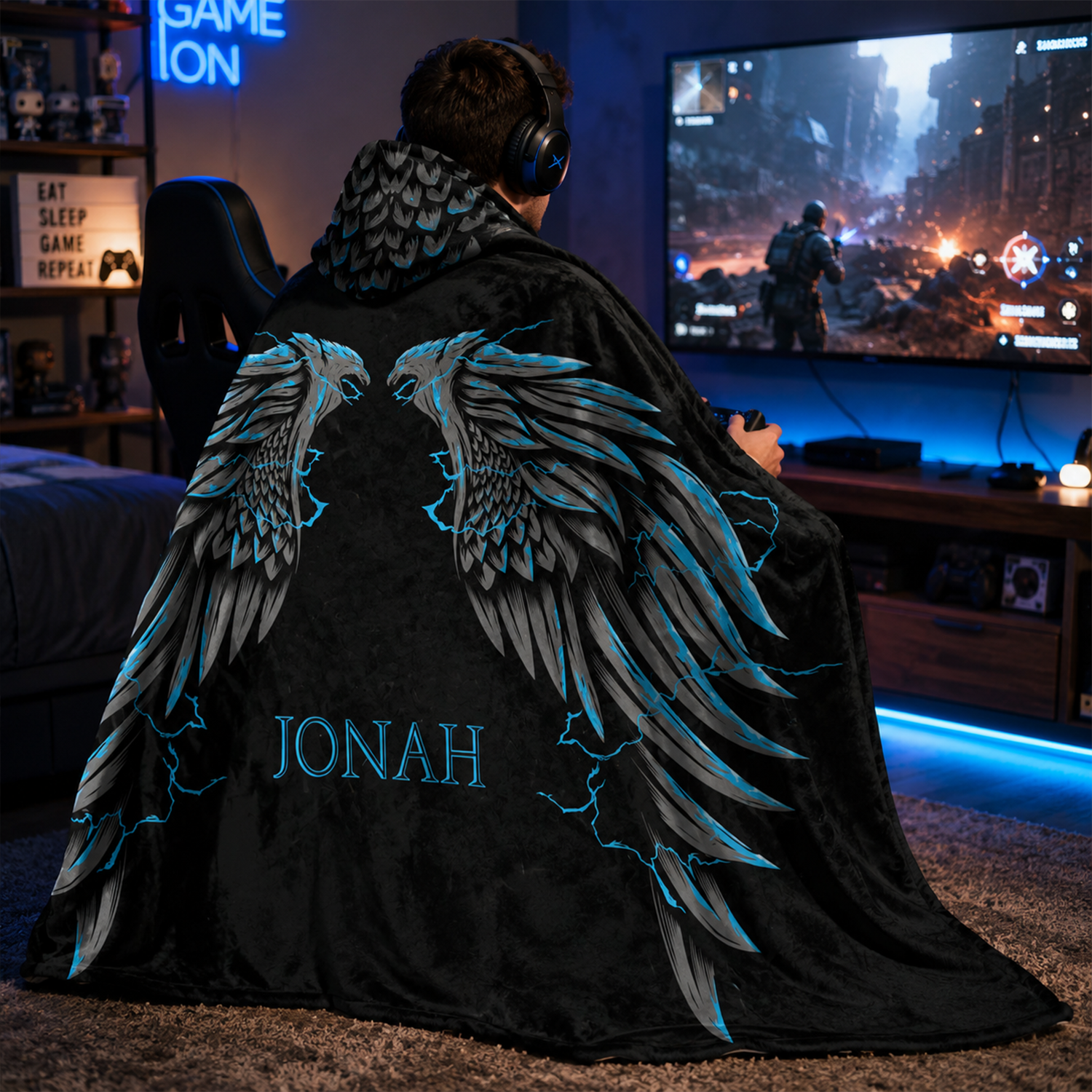Close-up of custom name on griffin wings Minky fleece hooded wearable blanket
