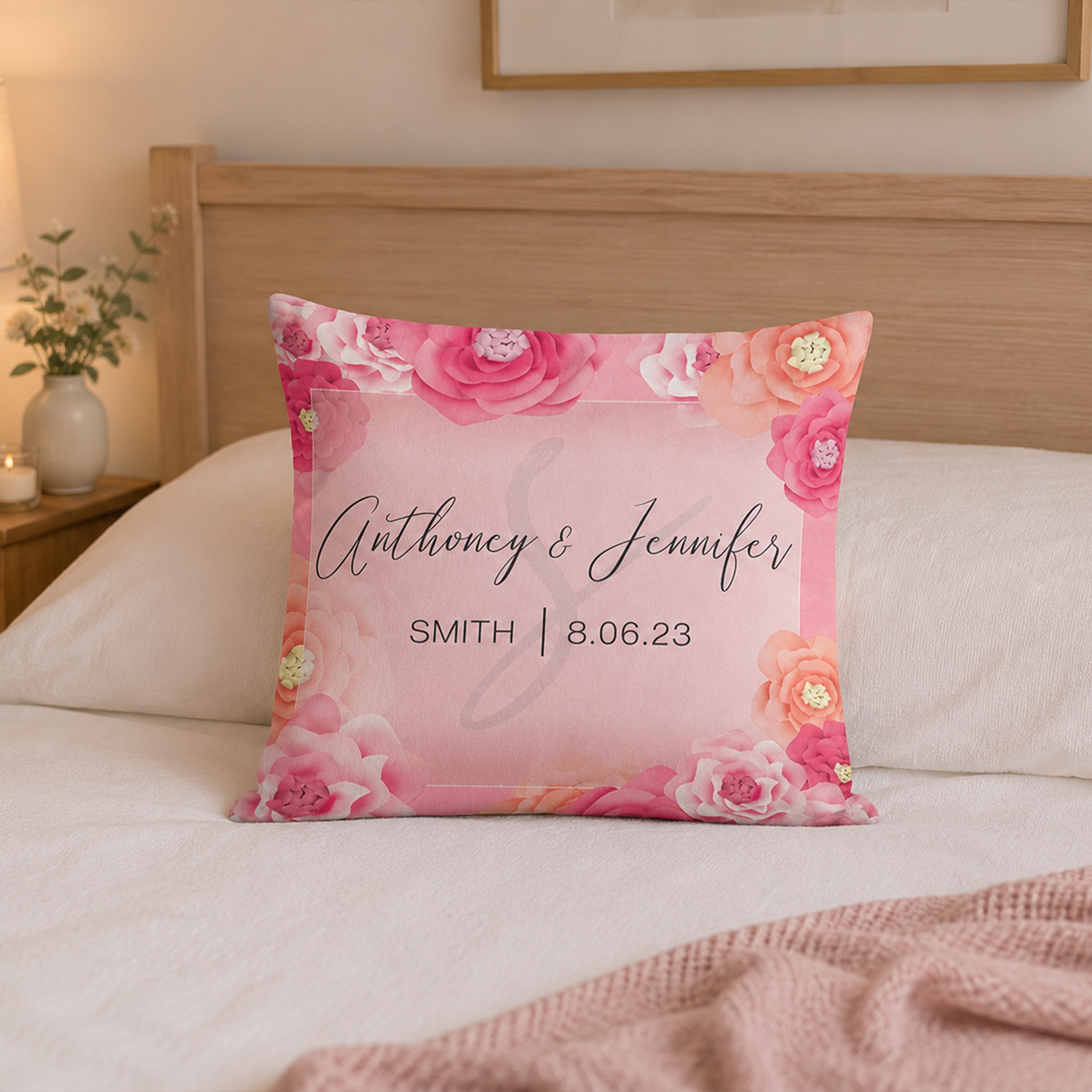 Close-up of custom monogram on wedding rose cotton throw pillow 16 by 16 inch
