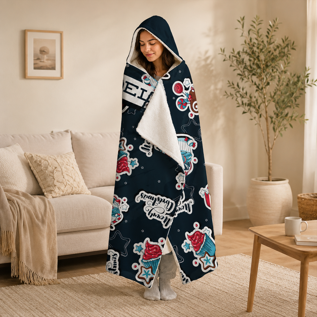 Child wearing personalized Christmas sweets hooded blanket as cozy holiday season gift

