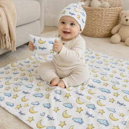 Personalized moon and stars swaddle set as dreamy baby shower gift for new parents
