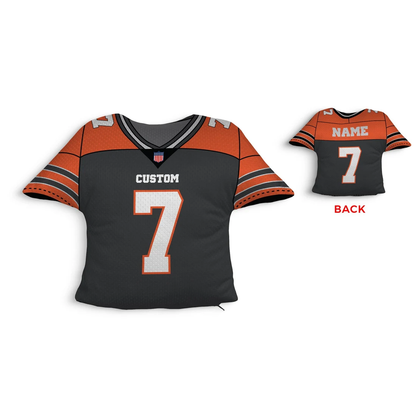 Custom football jersey pillow in black & orange as personalised birthday gift for fans
