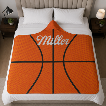 Basketball player wearing personalized hooded fleece blanket as birthday sports gift
