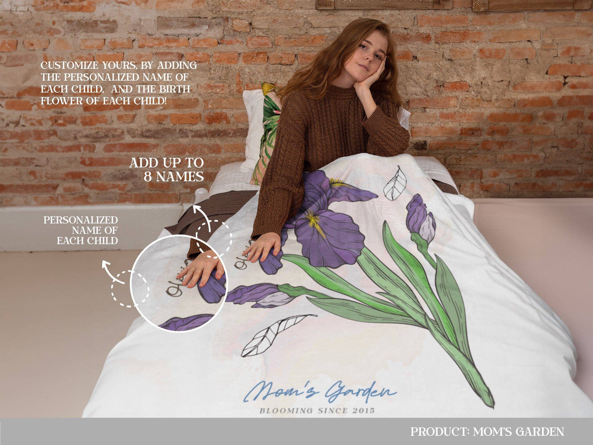 A young girl lying on a bed, half-covered with a customized floral Mom's Garden blanket with personalized names.
