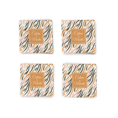 A set of 4 Personalized Orange watercolor Fabric Coasters on a white surface