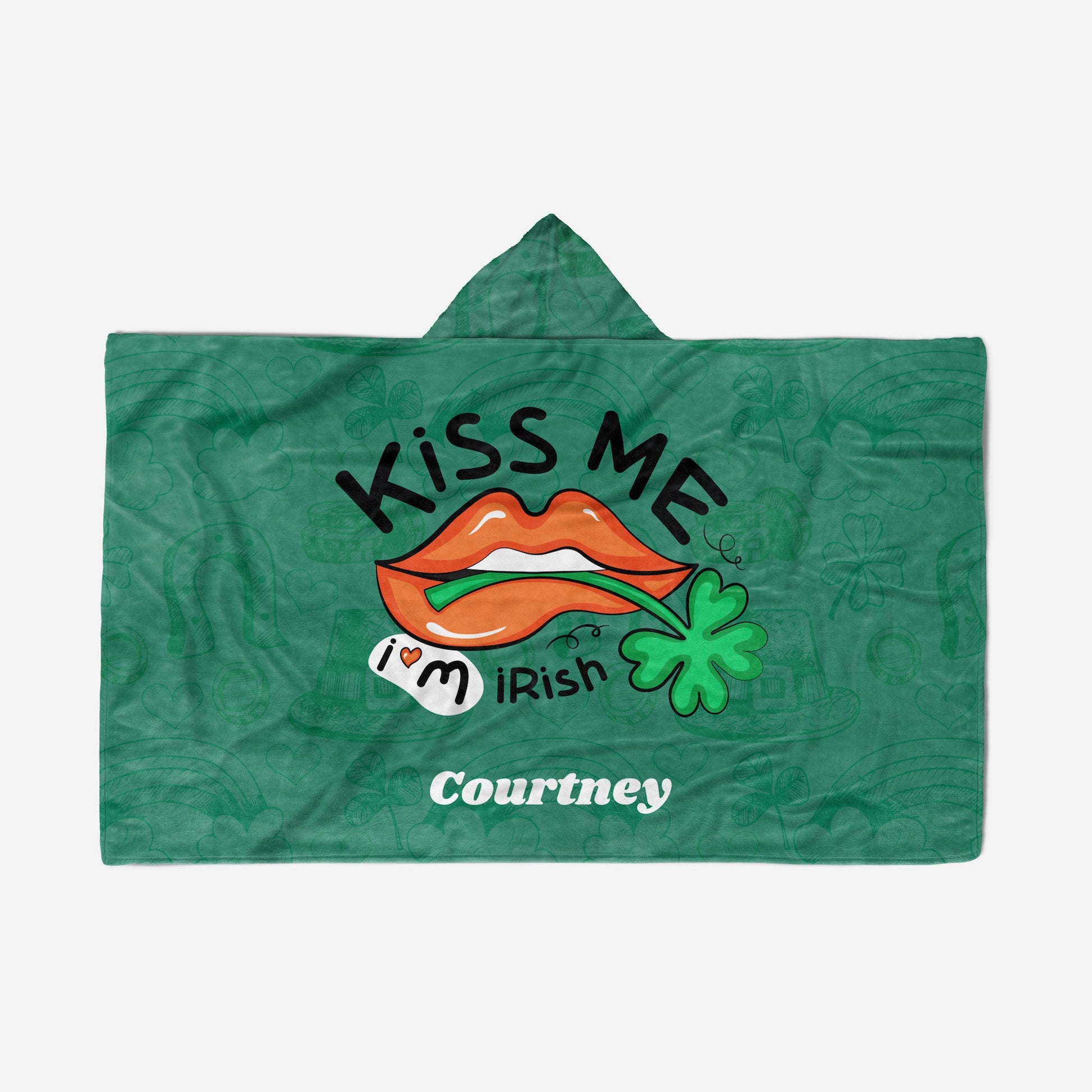 Green hooded blanket with "Kiss Me I'm Irish," orange lips, a shamrock, and the name "Courtney" at the bottom.