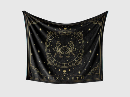 A black throw fleece blanket with Cancer Zodiac sign and customized name with a white background