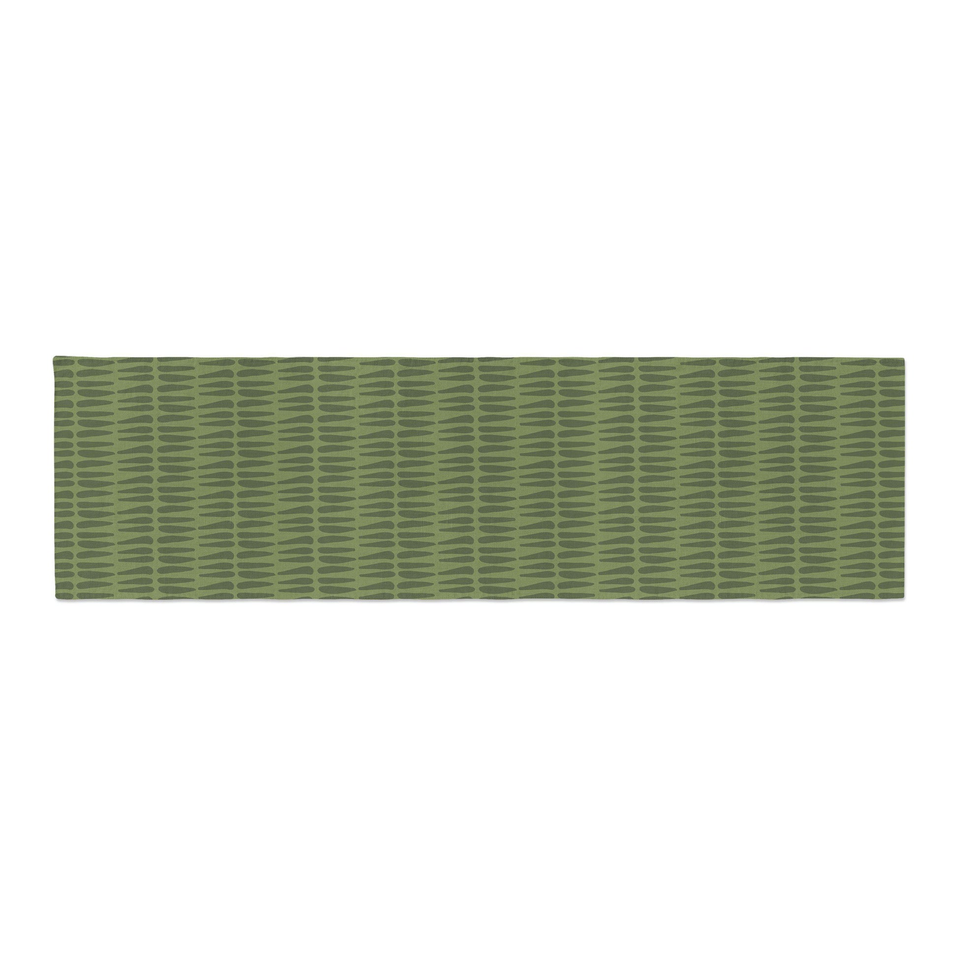 A Green Tribal Table Runner displayed flat on a white surface